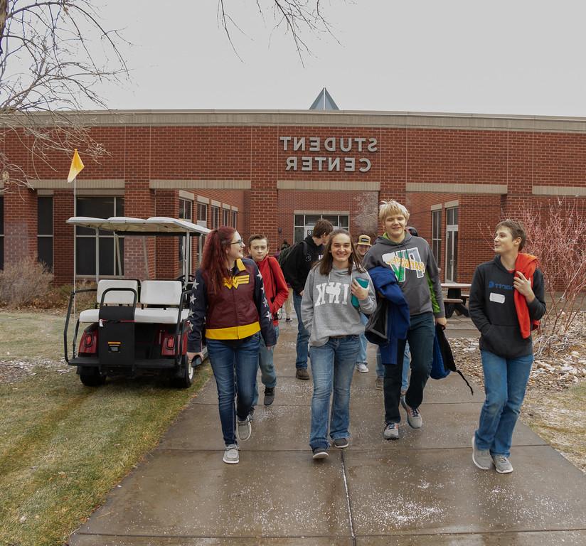 Group of students walking on campus